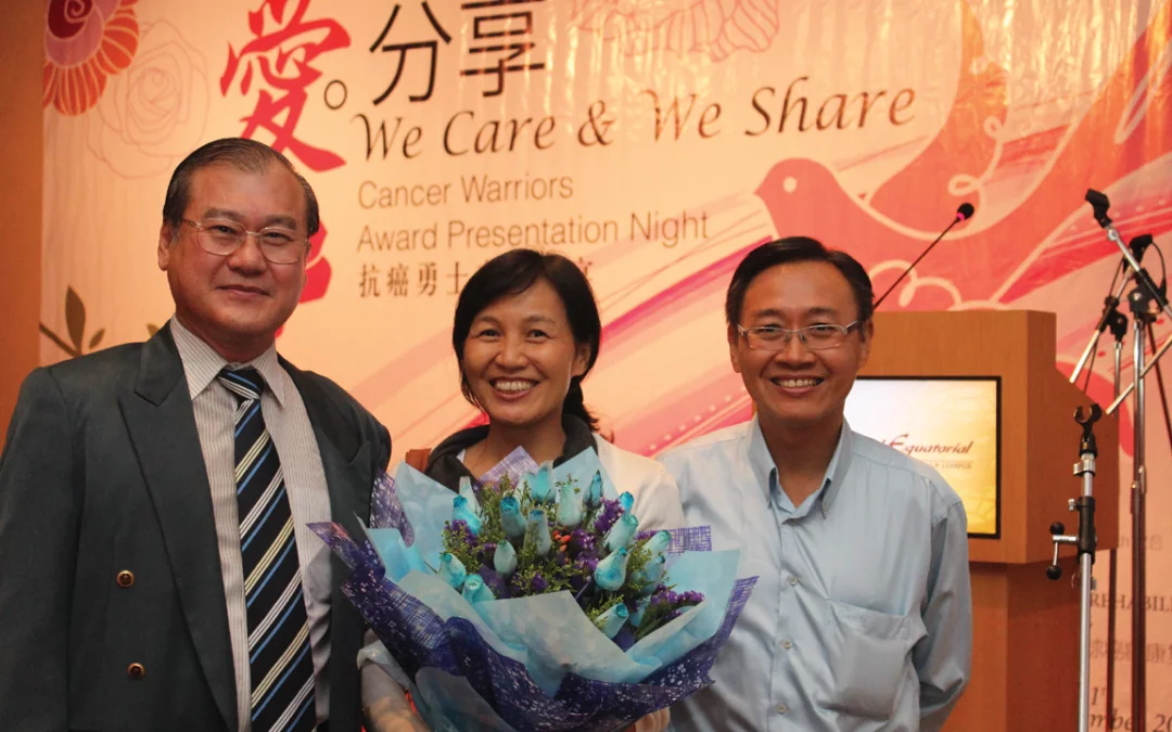 Mrs. Pang with family during her recovery journey